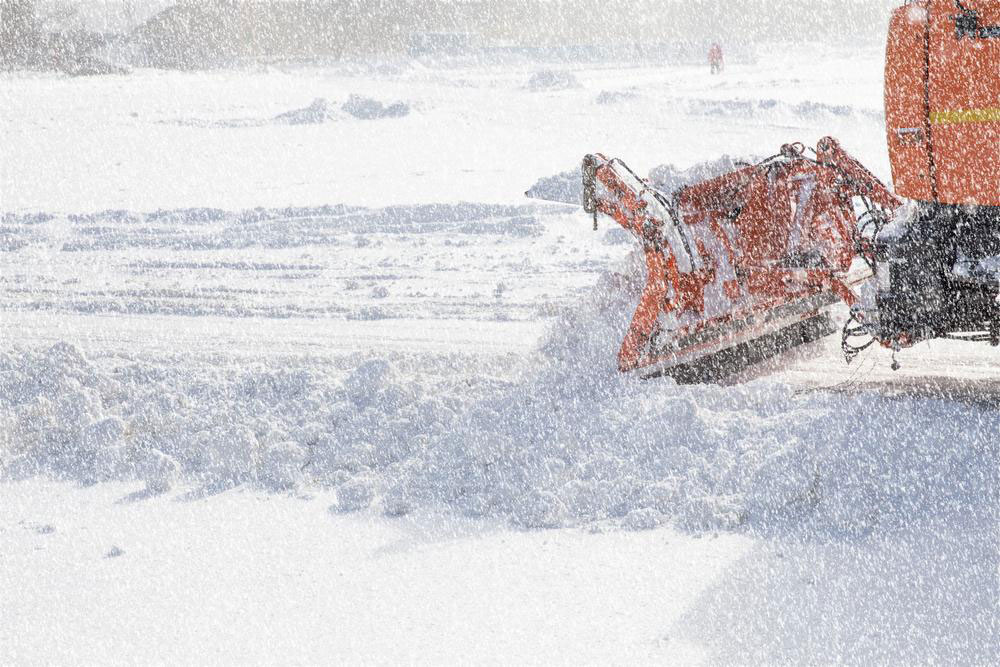 Choosing between a hired contractor and DIY for snow plowing